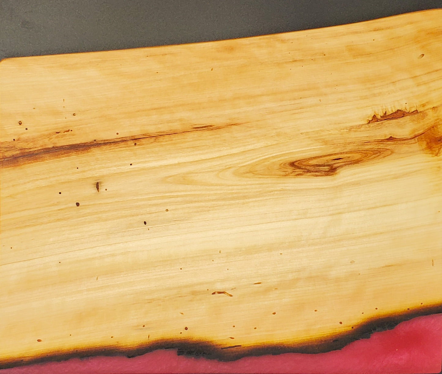 Aspen and coral red remnant cutting board