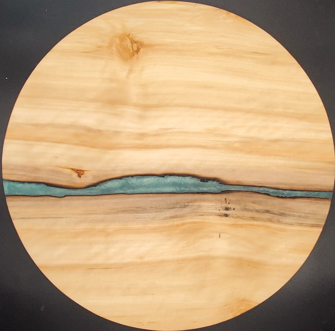 Aspen and teal remnant round cutting board